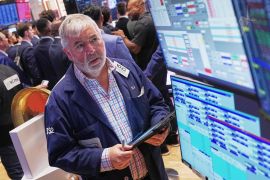 Trader Edward McCarthy works on the floor of the New York Stock Exchange, Thursday, June 25, 2026. (AP Photo/Richard Drew)